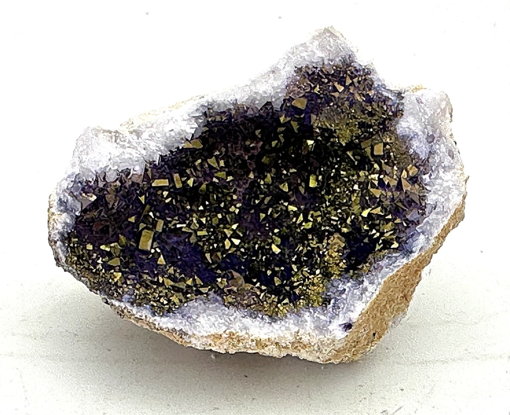 110.39 gram Aura Chalcedony Geode Cluster: A crystal of forgotten knowledge with ancient ties to the lost civilization of Atlantis, Aura Chalcedony is a cooling, calming stone that opens you up to new worlds and expands your imagination.