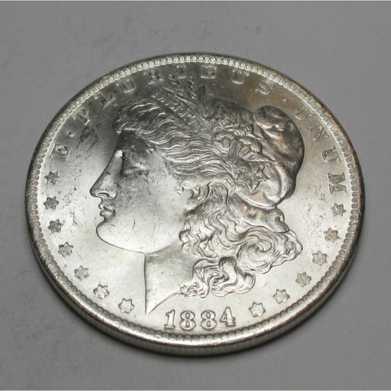1884 o BU Grade Morgan Silver Dollar: Type will be our choice and from on hand at time of sale. Item is the EXACT ITEM in the image. Bidder is responsible for all value and determination of value. The images are high