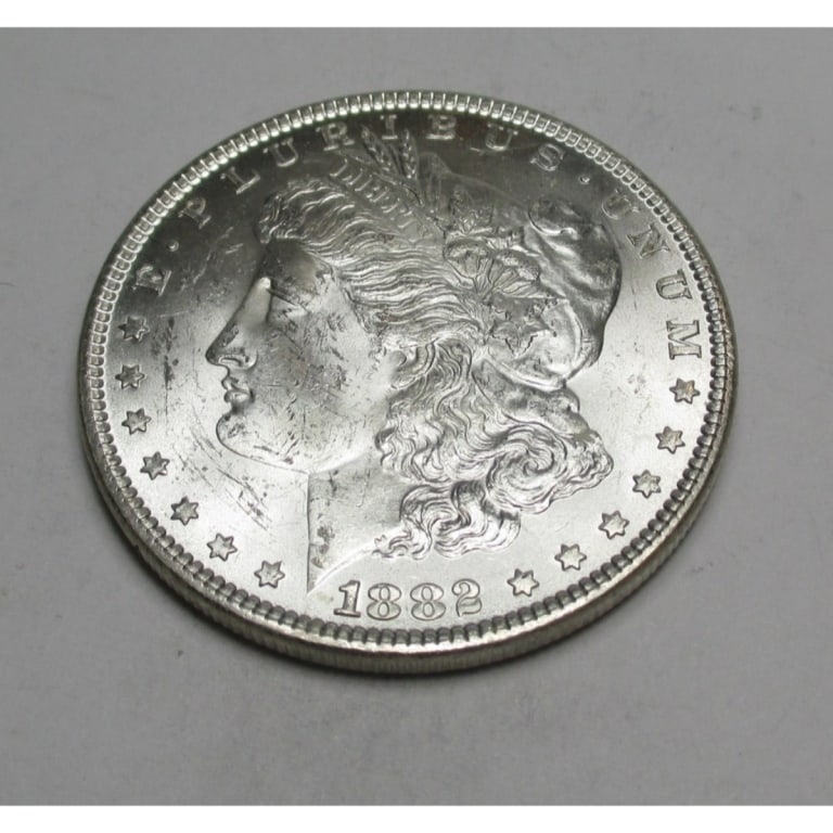 1882 P BU Grade Morgan Dollar: Type will be our choice and from on hand at time of sale. Item is the EXACT ITEM in the image. Bidder is responsible for all value and determination of value. The images are high resolutionandtheEXACT
