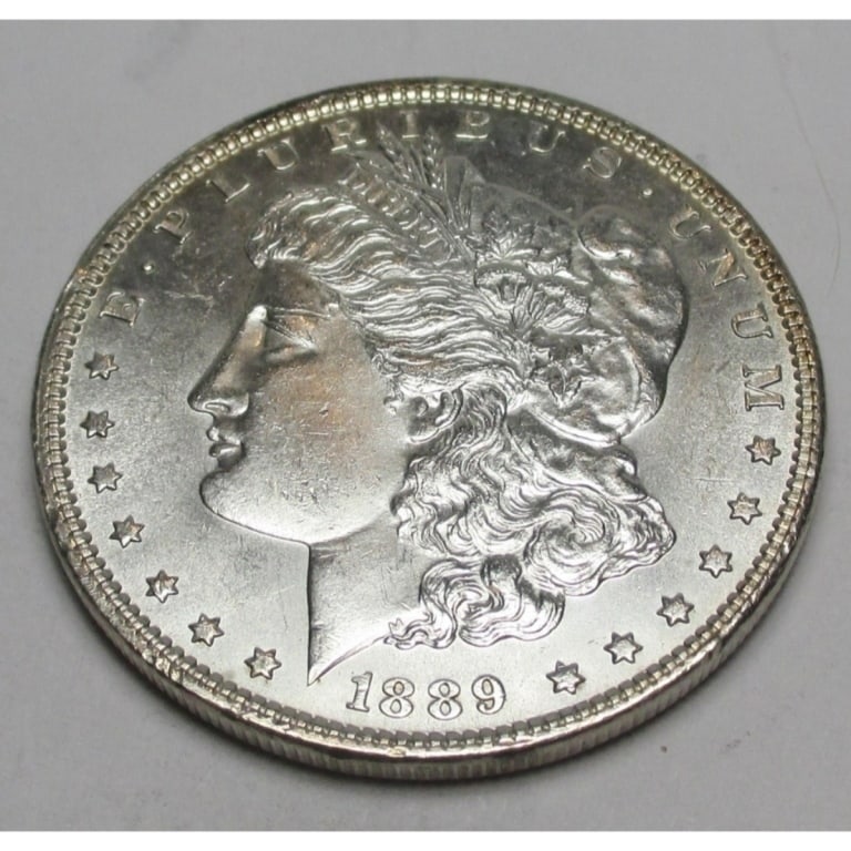 1889 P BU Grade Morgan Silver Dollar: Type will be our choice and from on hand at time of sale. Item is the EXACT ITEM in the image. Bidder is responsible for all value and determination of value. The images are high resolution