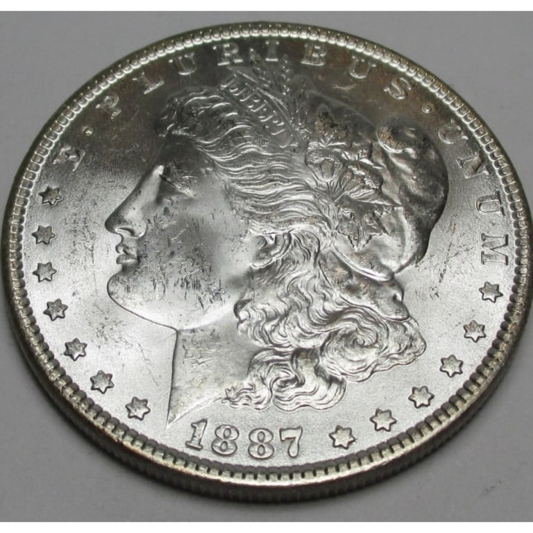 1887 P BU Grade Morgan Silver Dollar: Type will be our choice and from on hand at time of sale. Item is the EXACT ITEM in the image. Bidder is responsible for all value and determination of value. The images are high resolution