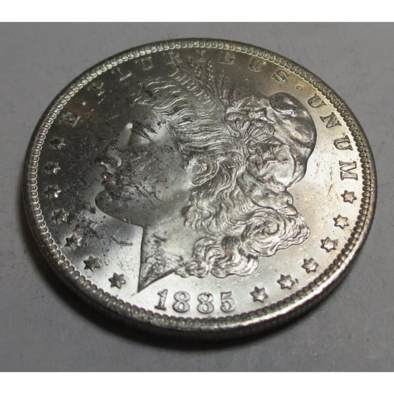 1885 O BU Grade Morgan Silver Dollar: Type will be our choice and from on hand at time of sale. Item is the EXACT ITEM in the image. Bidder is responsible for all value and determination of value. The images are high resolution
