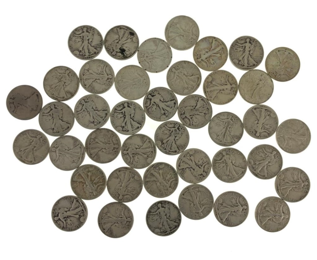 (40) Random Date/Grade Walking Liberty Halves: Item is as shown in the image - Due to the fact that we have more than one of these items, winning bidder may not receive the exct item in the image- Winning bidder will receive exact date and grade