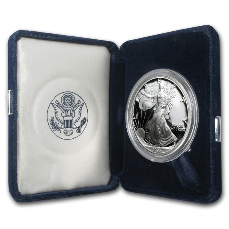 1995 US Silver Eagle in OMP: Item is as shown in the image - with original mint packaging. Please review all terms and conditions prior to placing any bids - All invoices due at the end of the sale - All sales final - All bids