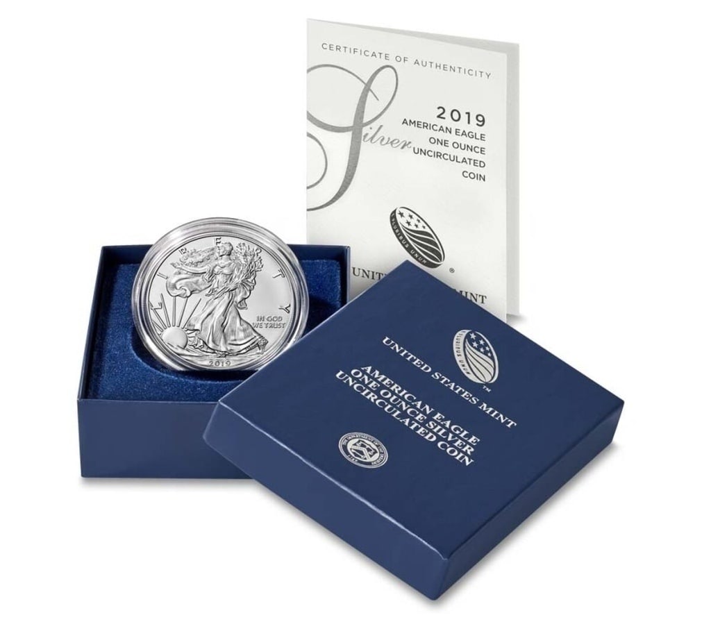2019 US Silver Eagle in OMP: Item is as shown in the image - with original mint packaging. Please review all terms and conditions prior to placing any bids - All invoices due at the end of the sale - All sales final - All bids