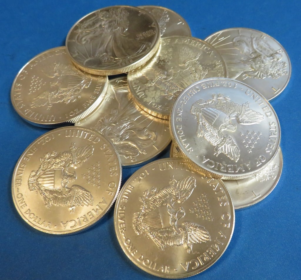 (10) Random Date US Silver Eagles: Items are as shown in image and described in title- Random date and large bulk lots may be stock images, since we have more than one of the items in the lot.