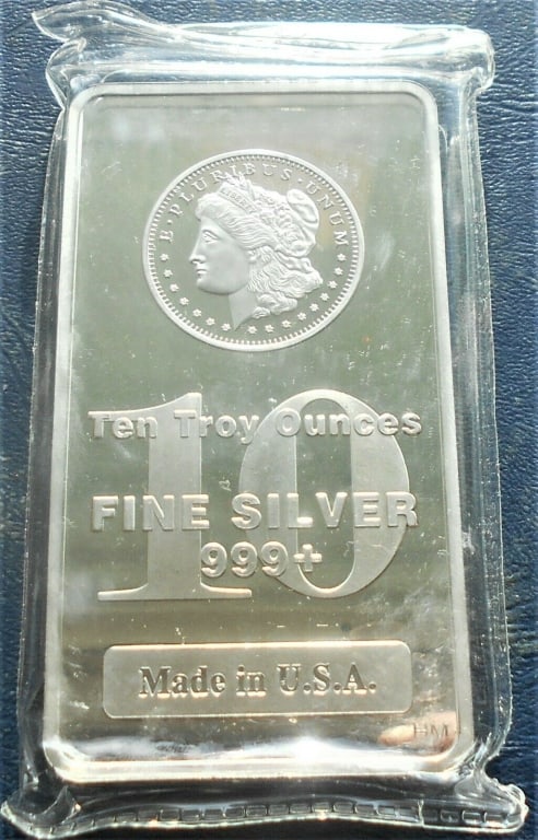 10 oz. Random Design Silver Bar: Items are as shown in image and described in title- Random date and large bulk lots may be stock images, since we have more than one of the items in the lot.