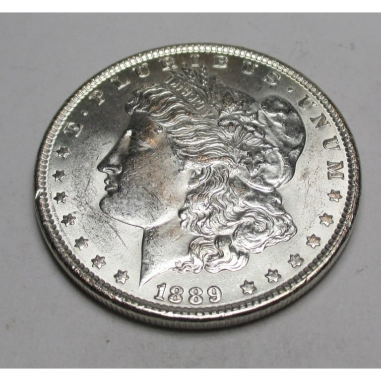 1889 P BU Grade Morgan Silver Dollar: Type will be our choice and from on hand at time of sale. Item is the EXACT ITEM in the image. Bidder is responsible for all value and determination of value. The images are high resolution