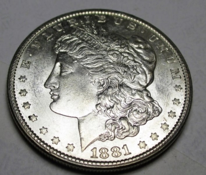 1881 s BU Grade Morgan Silver Dollar: Type will be our choice and from on hand at time of sale. Item is the EXACT ITEM in the image. Bidder is responsible for all value and determination of value. The images are high resolution andtheEXAC