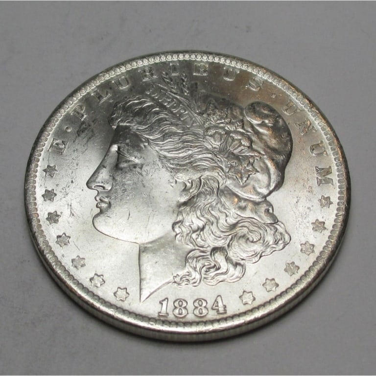 1884 o BU Grade Morgan Silver Dollar: Type will be our choice and from on hand at time of sale. Item is the EXACT ITEM in the image. Bidder is responsible for all value and determination of value. The images are high resolution and
