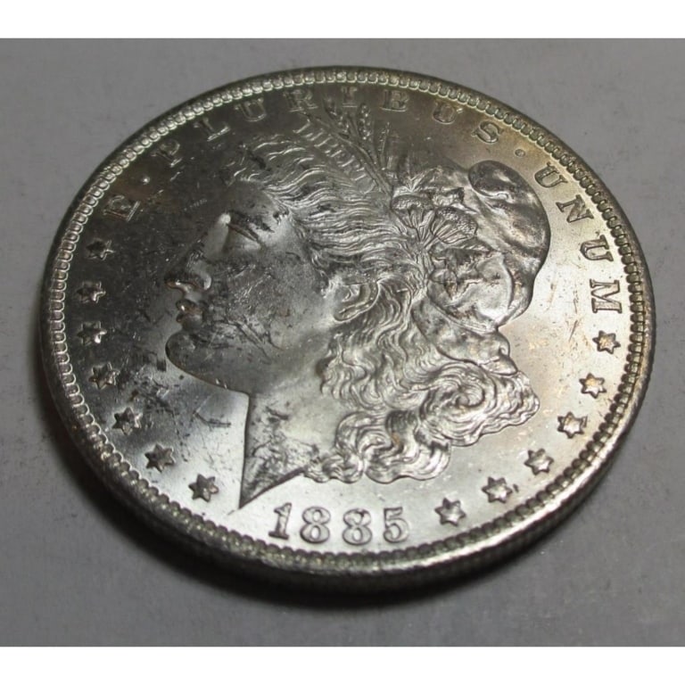 1885 O BU Grade Morgan Silver Dollar: Type will be our choice and from on hand at time of sale. Item is the EXACT ITEM in the image. Bidder is responsible for all value and determination of value. The images are high resolution and