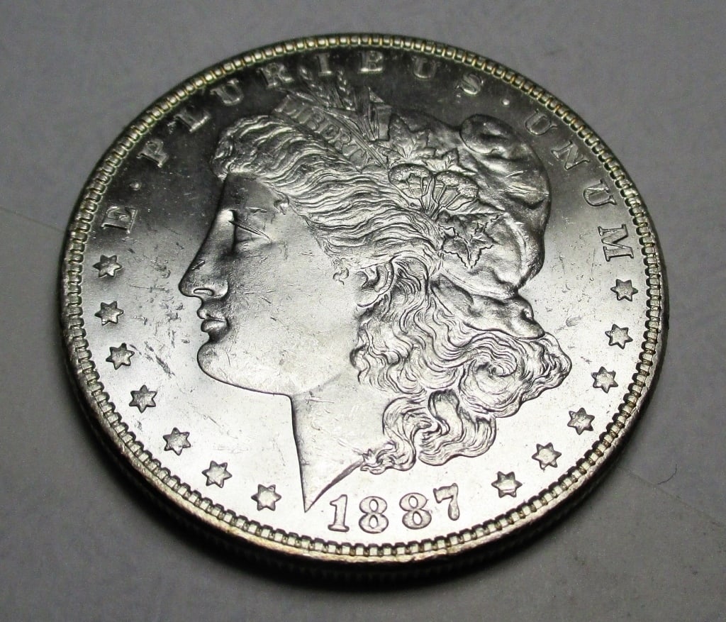 1887 P BU Morgan Silver Dollar: Items are as shown in image. Bidder is responsible for all grade and value. Please review all terms and understand shipping procedure prior to bidding.