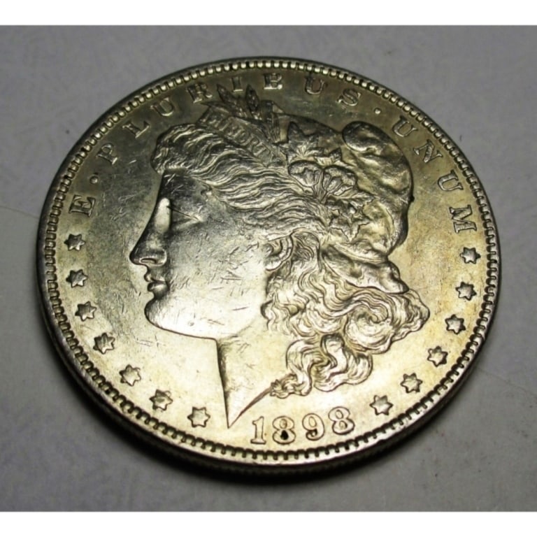 1898 P Morgan Silver Dollar: Items are as shown in image. Bidder is responsible for all grade and value. Please review all terms and understand shipping procedure prior to bidding.