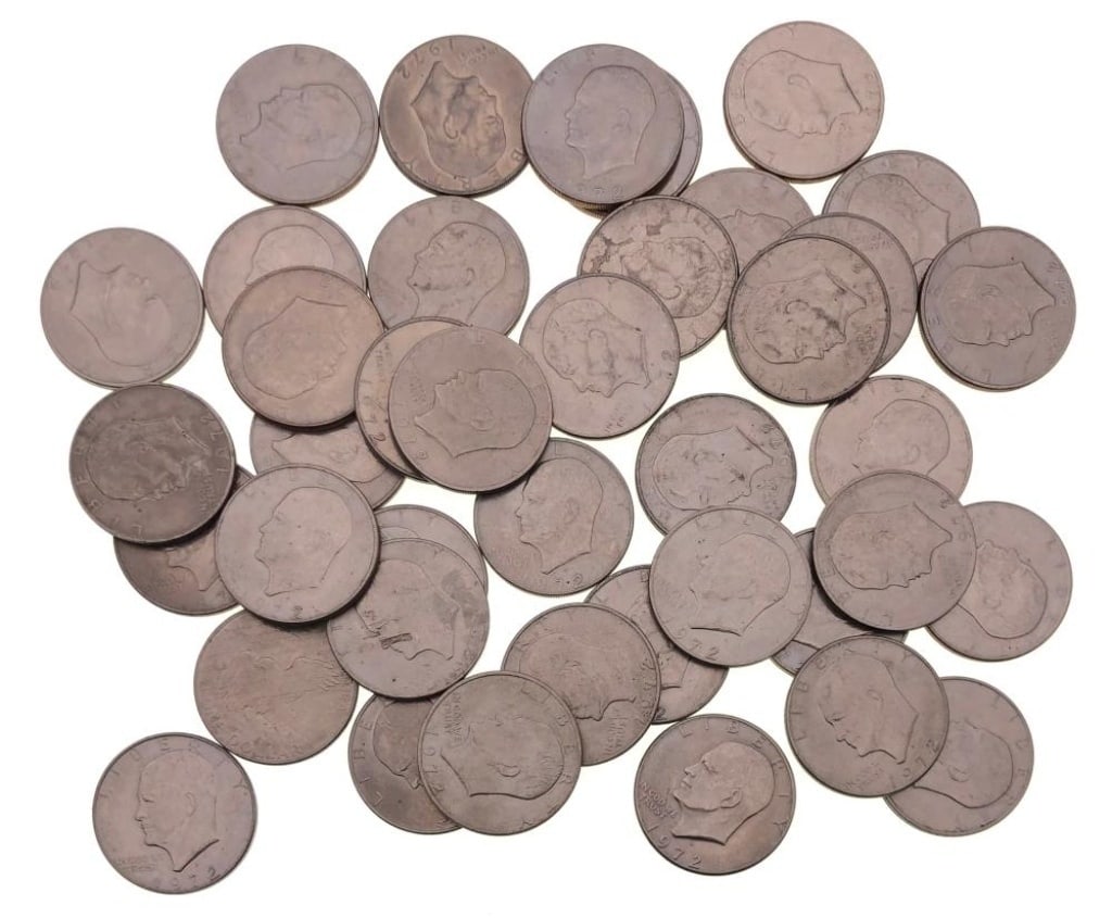 (40) 1971-78 Ike Dollars Various Dates Grades: Items are as shown in the image and described in the title - Please note that we have more than one of these items and the exact item in the image may not be the item you recieve. Winning bidder will