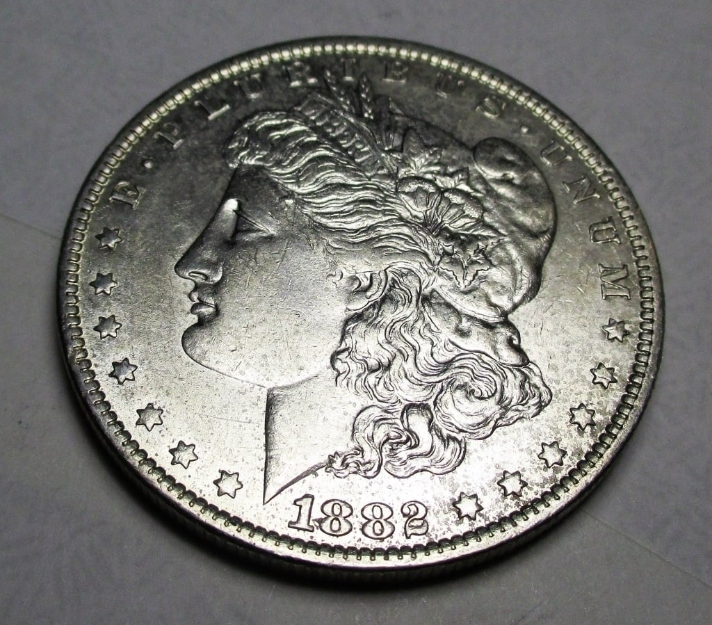 1882 O Tougher Date Morgan Silver dollar: Items are as shown in image. Bidder is responsible for all grade and value. Please review all terms and understand shipping procedure prior to bidding.