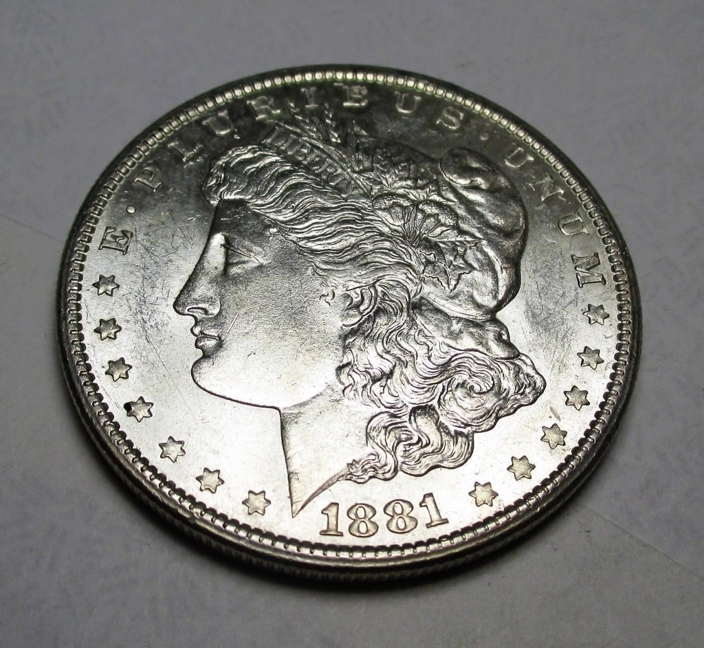 1881 s BU Morgan Silver Dollar: Items are as shown in image. Bidder is responsible for all grade and value. Please review all terms and understand shipping procedure prior to bidding.