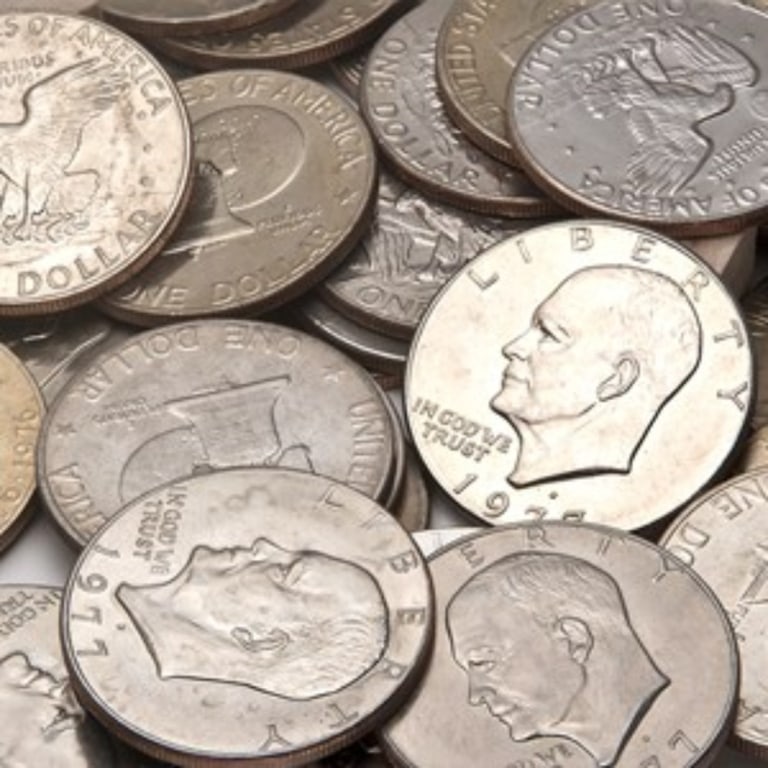 (60) Random Date/Grade Clad Ike Dollars: Items are as shown in the image and will be as described- Please review all terms and conditions prior to placing any bids-