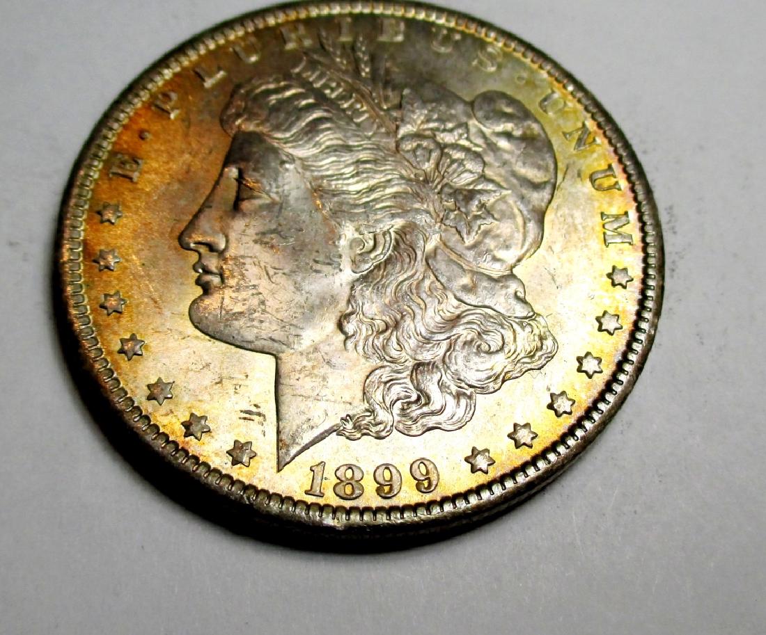 1899 O RAINBOW TONED Morgan Silver Dollar (1 of 2)