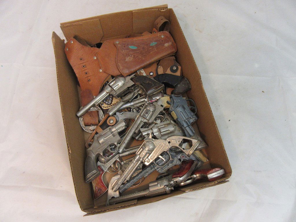 Toy Cap Guns Includes: Hubley, Mavrick, and Roy: All cap guns are in as is condition. Includes the Roy Rogers cap gun. Some include holsters as shown in photos.