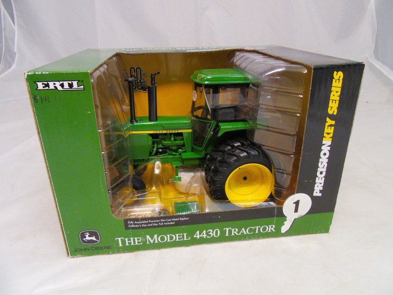 Ertl John Deere Precision Key Series Model 4430 Tractor: Tractor is new. Includes original box. Good condition.