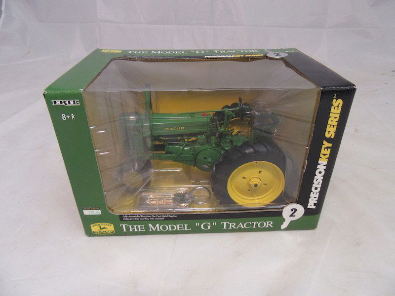 Ertl John Deere Precision Key Series Model G Tractor: Tractor is new. Includes original box. Good condition.
