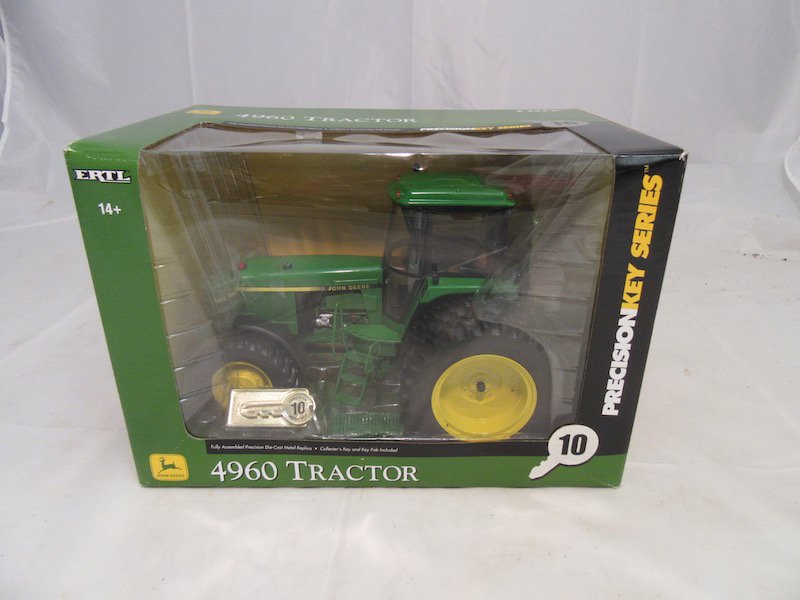 Ertl John Deere Precision Key Series Model 4960 Tractor: Tractor is new. Includes original box. Good condition. Normal wear.