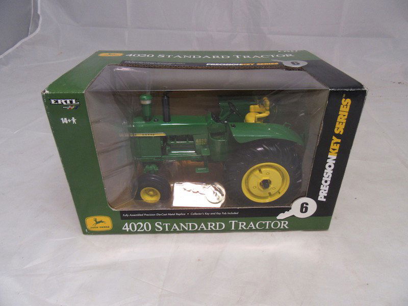 Ertl John Deere Precision Key Series Model 4020: Tractor is new. Includes original box. Good condition. Normal wear.