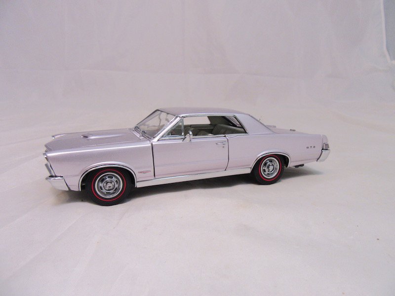 Danbury Mint 1965 Pontiac GTO: Great condition. Includes the box, inserts, certificate of authenticity, and more.