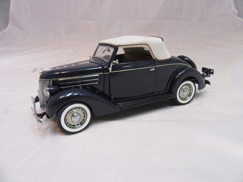 Danbury Mint 1936 Ford Deluxe Cabriolet: Great condition. Includes the box, inserts, certificate of authenticity, and more.