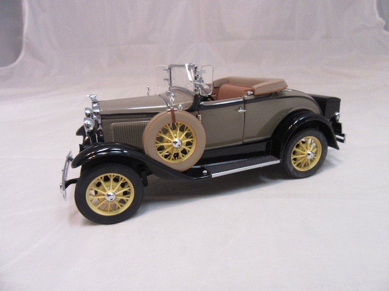 Danbury Mint 1931 Ford Model A: Great condition. Includes the box, inserts, certificate of authenticity, and more.