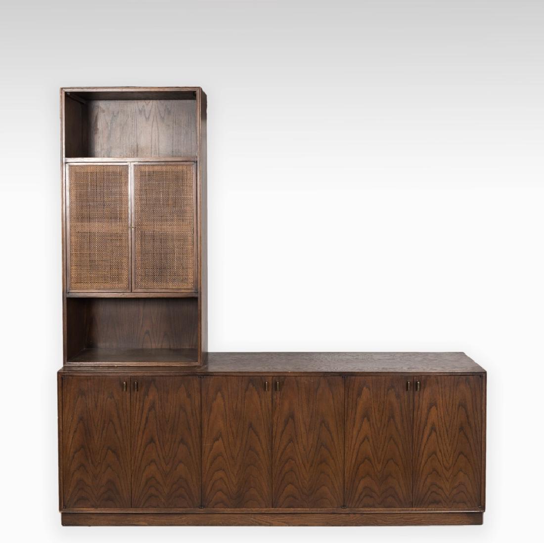 Mid Century Oak Credenza: Description - A mid century oak credenza with brass pulls and cane door top. Dimensions - Base - 29" x 78" x 18" Cabinet Top - 52" x 26" x 13.5"