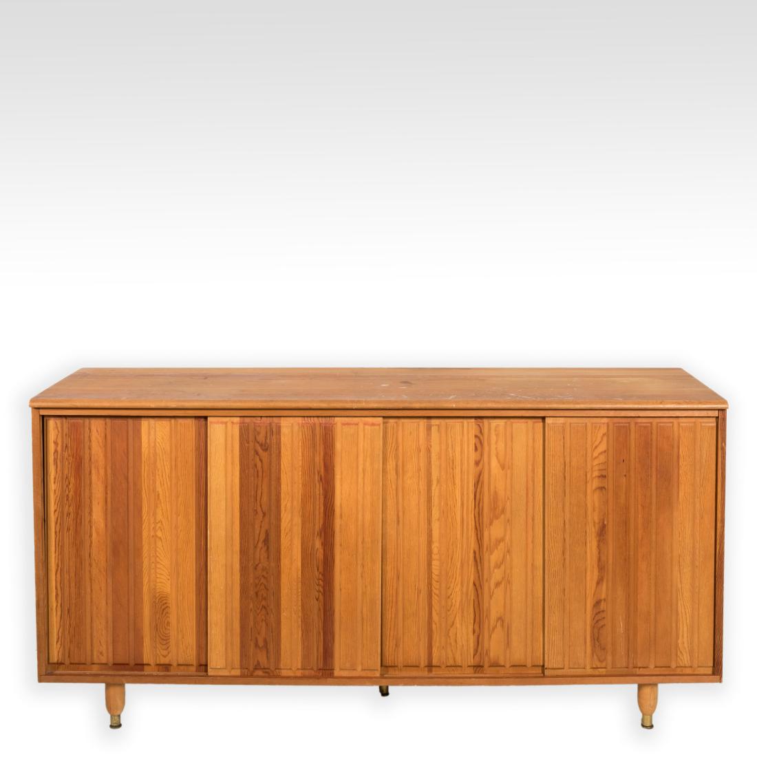 French Pine Credenza - Charlotte Perriand: Description - A French pine credenza in the manner of Charlotte Perriand. Dimensions - 29.5" x 59.5" x 18"