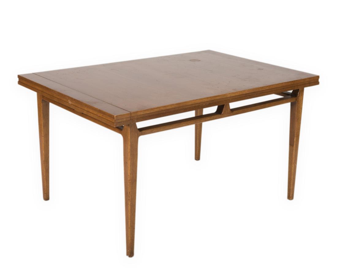 Drexel Profile Dining Room Table: Description - A Drexel Profile dining room table with two leaves. Dimensions - 30.5" x 56" x 38"