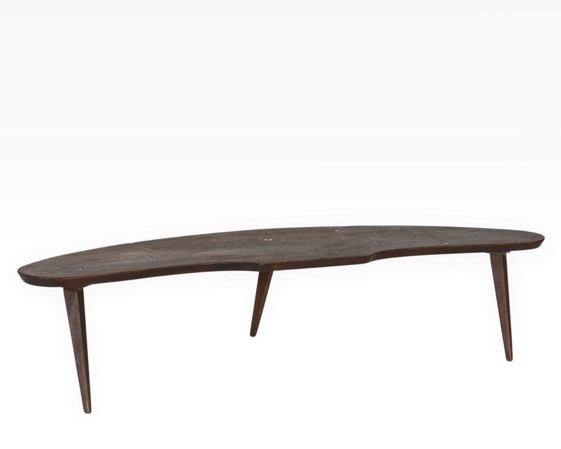 Boomerang Teak Coffee Table: Description - A boomerang teak coffee table. Dimensions - 15" x 71" x 19"