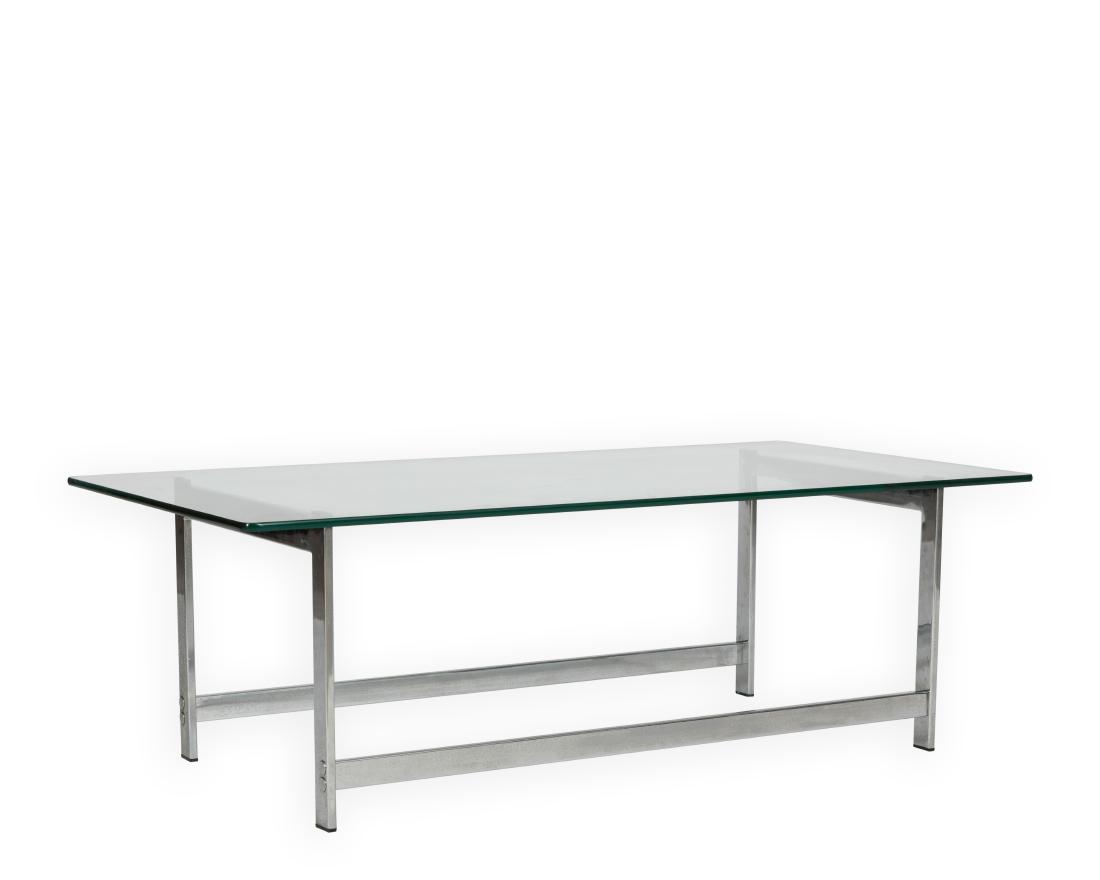 Chrome and Glass Coffee Table: Description - A chrome and glass coffee table. Dimensions - 16" x 50" x 25"
