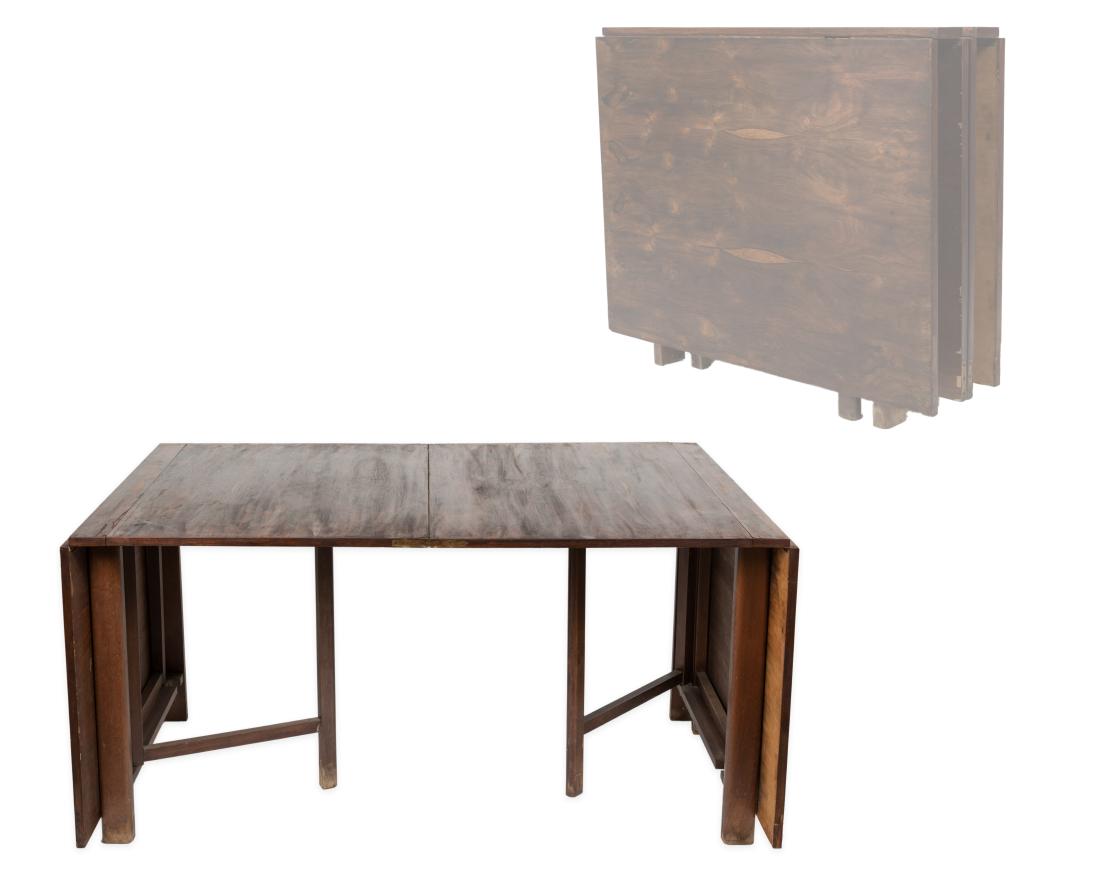 Rosewood Bruno Mathsson "Maria" Dining Table: Description - A rosewood Bruno Mathsson "Maria" dining table. Dimensions - Open - 29.5" x 60" x 35.5" Closed - 29.5" x 9.5" x 35.5" Leaves - 26"
