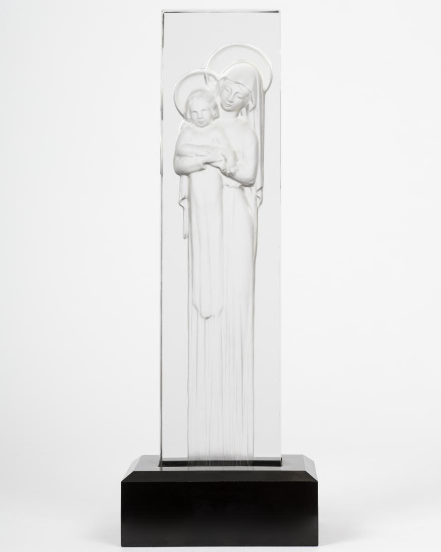 Lalique - Vierge a L'enfant Intaglio: Description - Signed Lalique France intaglio glass sculpture. Titled Vierge a L'enfant, model number 1217. Dimensions - 14.75" x 5.25" x 3.5"