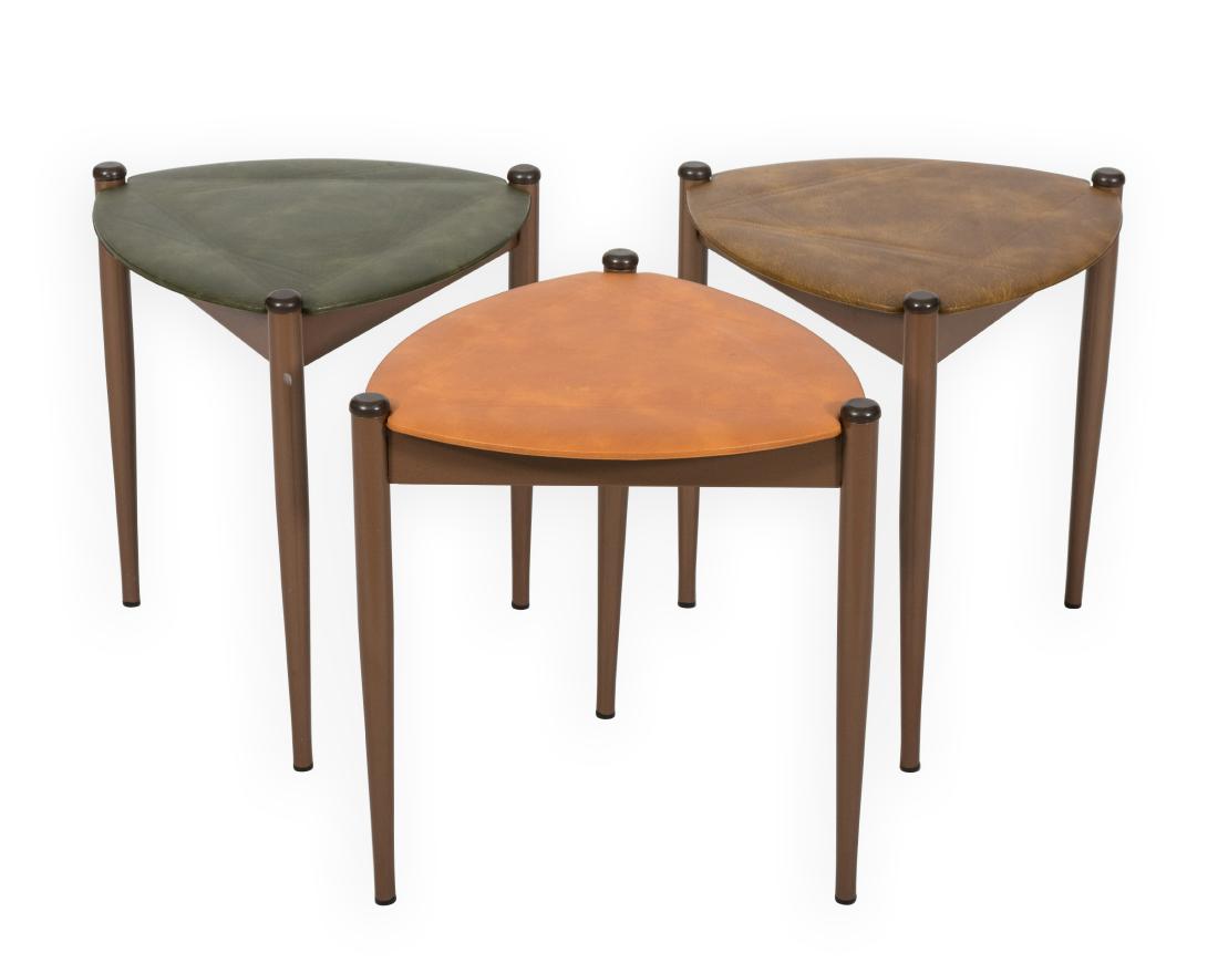 Nest of Metal and Leathers Stools: Description - A nest of metal and leather triangular stools. Dimensions - Each stool - 17.5" x 16.5"