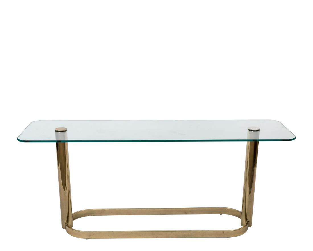 Brass and Glass Sofa Table: Description - A brass and glass console/sofa table. Dimensions - 27" x 66" x 18"