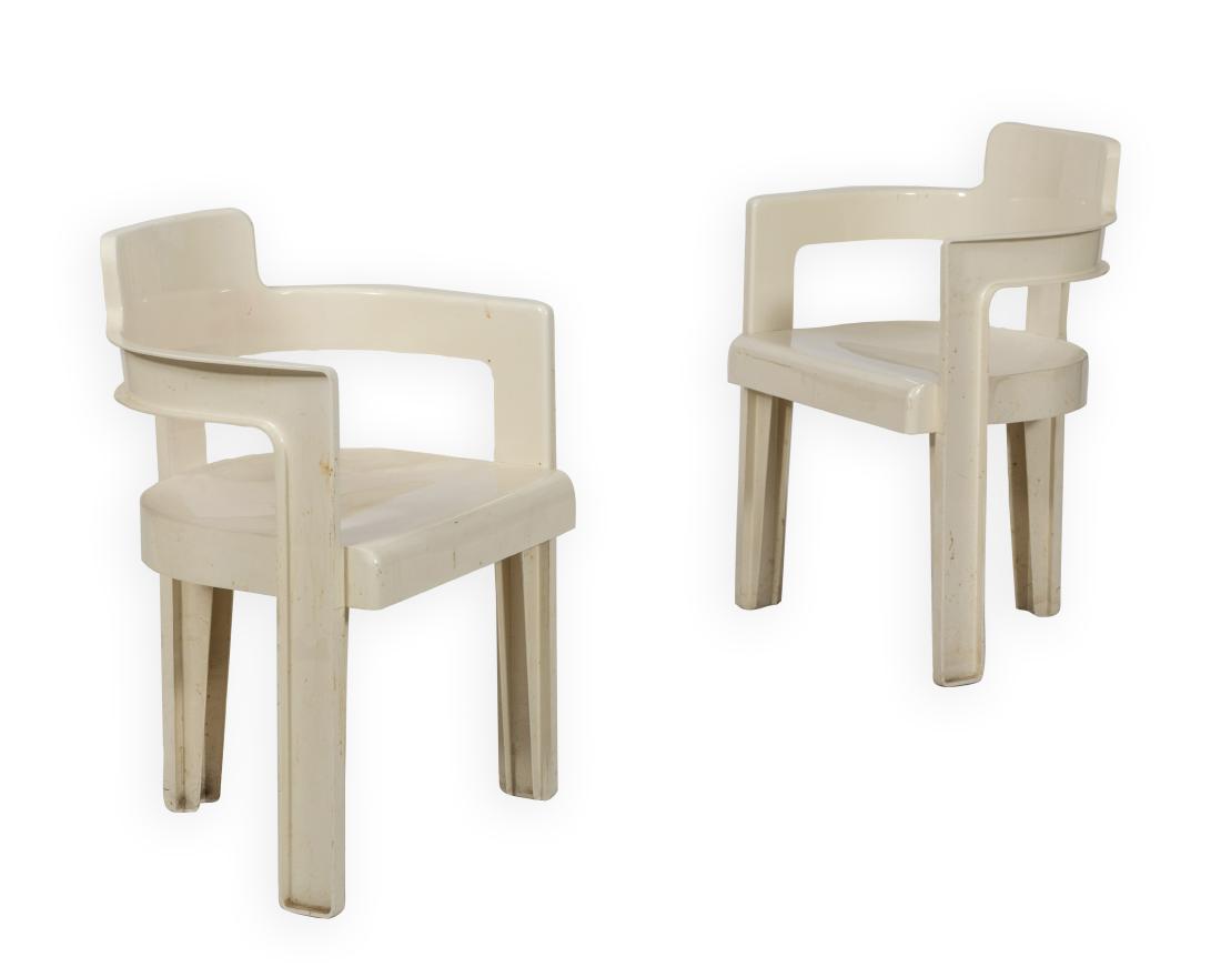 Pair Joe Colombo by Kartell Arm Chairs: Description - A pair of Joe Colombo by Kartell arm chairs. Dimensions - 29" x 21" x 18"