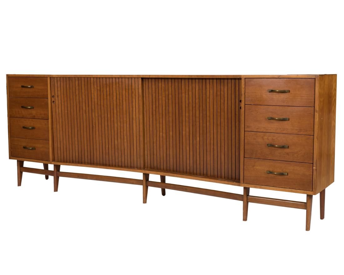 Concave Tambour Front Credenza: Description - A concave tambour front credenza on legs. Dimensions - 34" x 92" x 16"