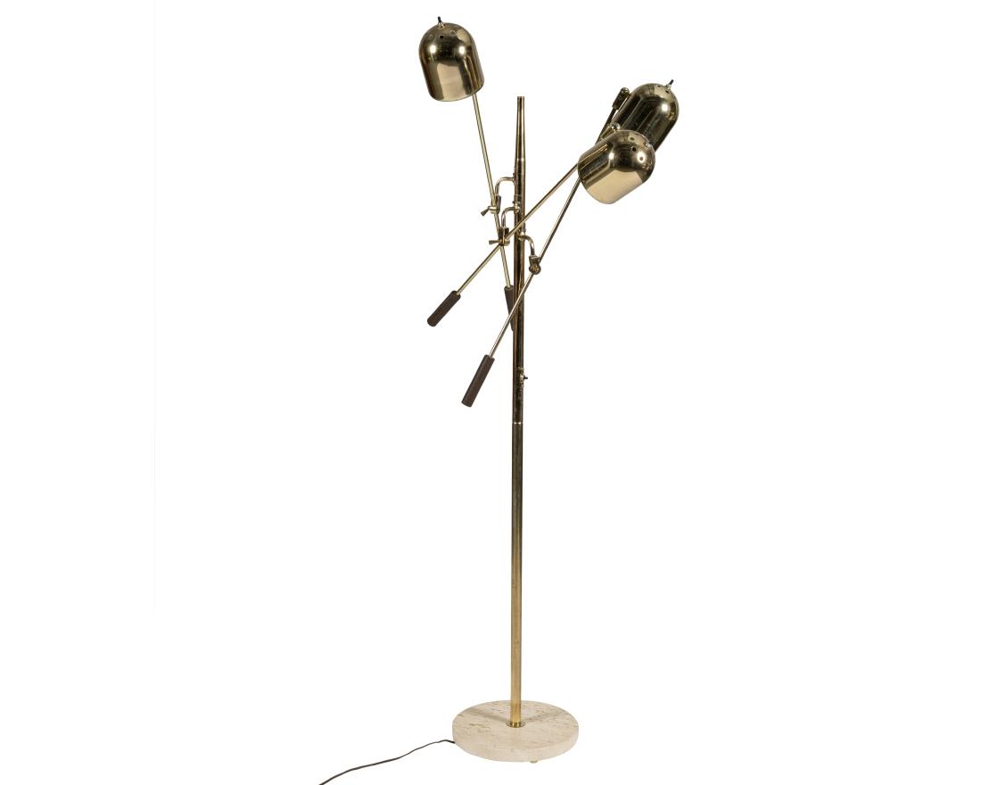 Triennale Brass Floor Lamp: Description - A triennale brass floor lamp with a travertine base. Dimensions - 69" x 18"