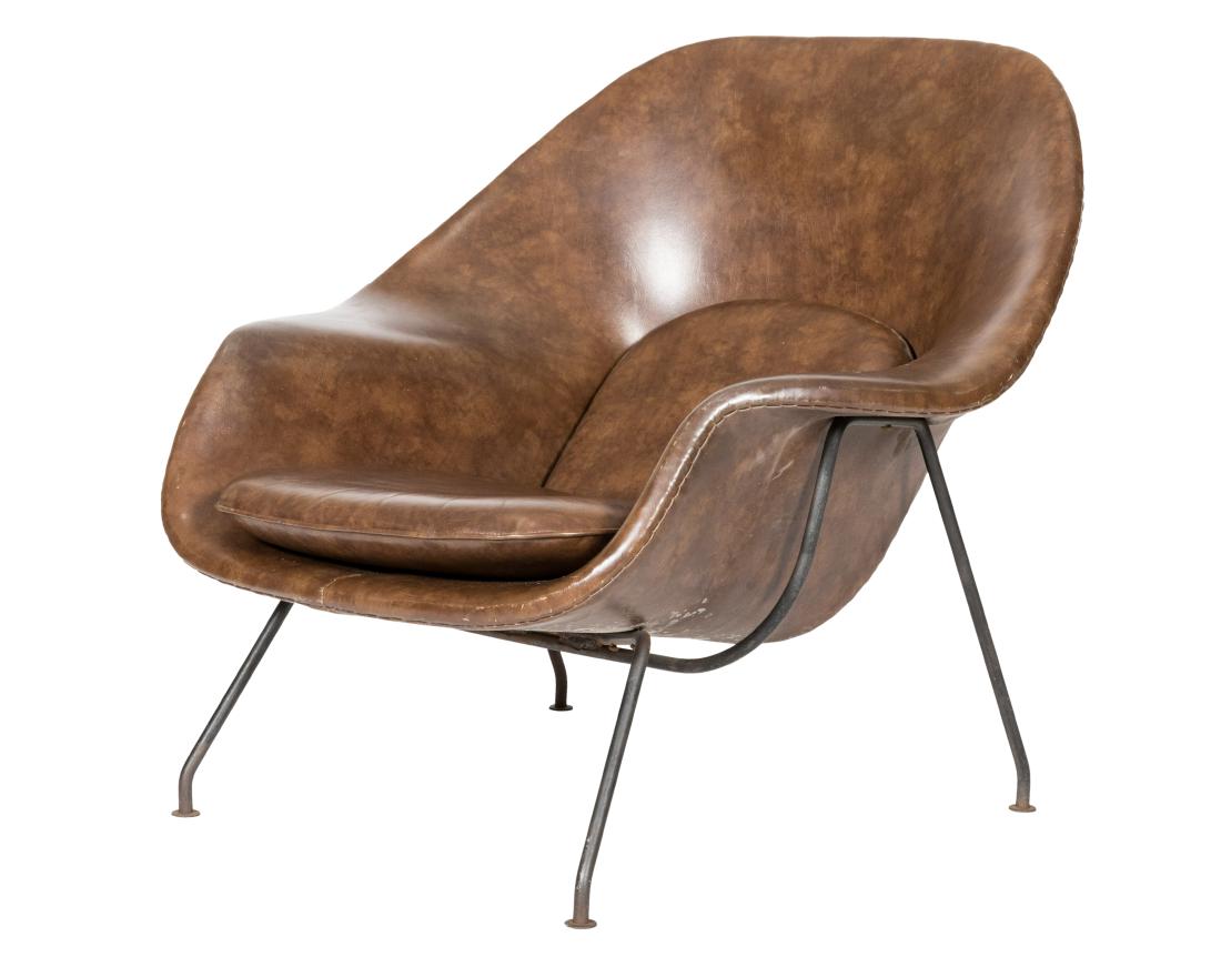 Eero Saarinen Womb Chair: Description - An Eero Saarinen womb chair. Dimensions - 35" x 38" x 36"