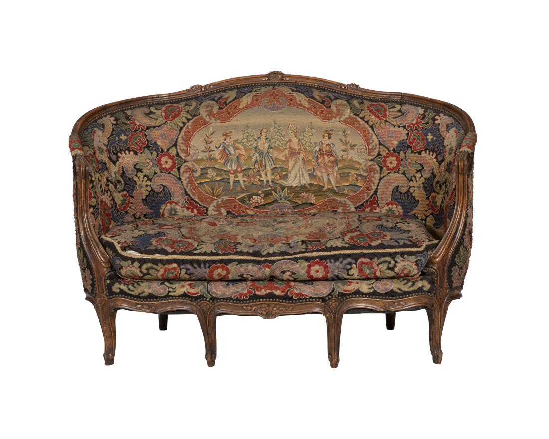 Louis XV Needlepoint Loveseat: Description - A Louis XV curved needlepoint loveseat. Dimensions - 39" x 57" x 29"