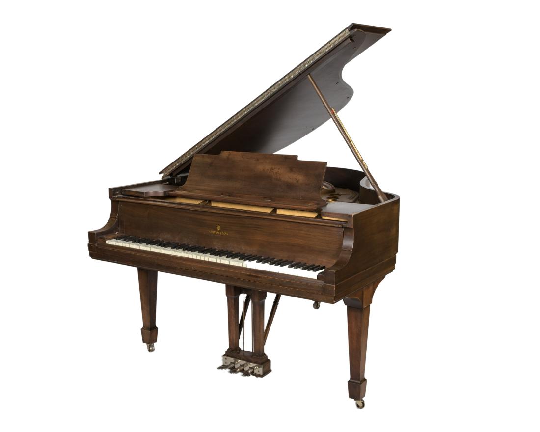 Steinway and Sons Baby Grand Piano #220442: Description - A steinway and Sons baby grand mahogany piano Model M #220442. Dimensions - 38" x 56" x 66"