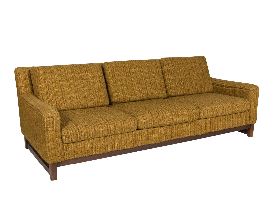 Selig Sofa on Walnut Base - Signed: Description - A Selig sofa on a walnut base, signed. Dimensions - 29" x 83" x 36"