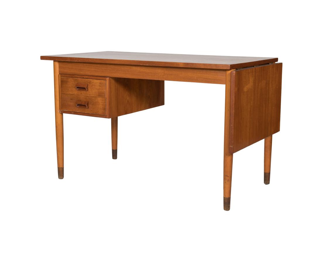 Drop Leaf Desk -Arne Vodder (Attr.): Description - A drop leaf teak desk in the manner of Arne Vodder Dimensions - Leaf down - 29" x 48" x 26". Leaf - 15"