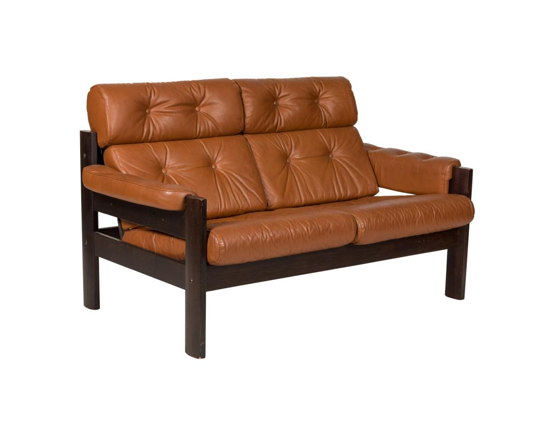 Ekornes Teak and Leather Loveseat: Description - A Ekornes teak and leather loveseat. Dimensions - 32" x 55" x 32"