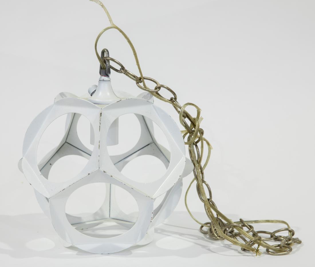 White Webbed Light Fixture: Description - A white webbed light fixture. Dimensions - Body - 10" x 10"