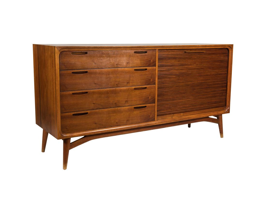 Scandinavian Walnut Credenza: Description - A Scandinavian walnut credenza with tambour doors and finished back. Dimensions - 33.75" x 64.75" x 19.5"
